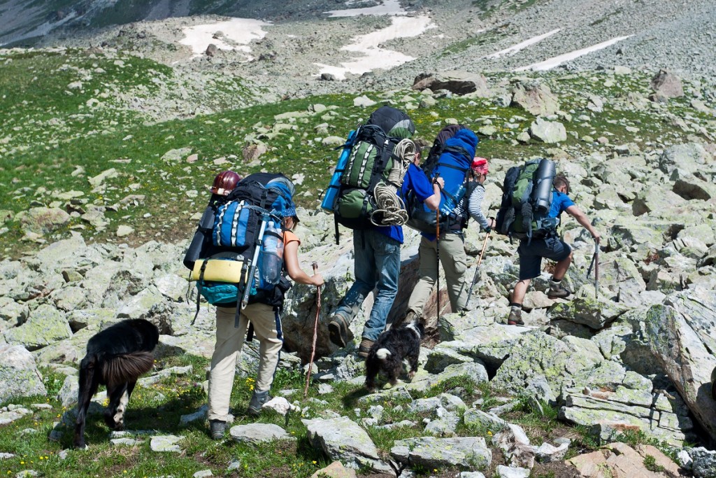 Group of hikers in mountain wally.